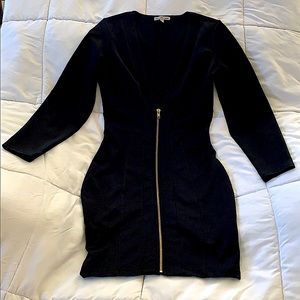 Black dress with a gold zipper